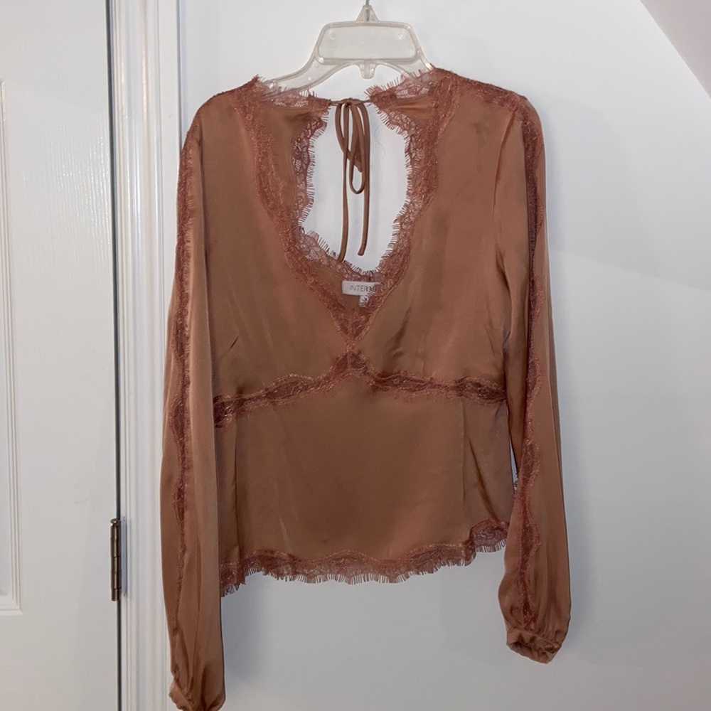 Intermix silk laced blouse in pink! Intricate lace details throughout!